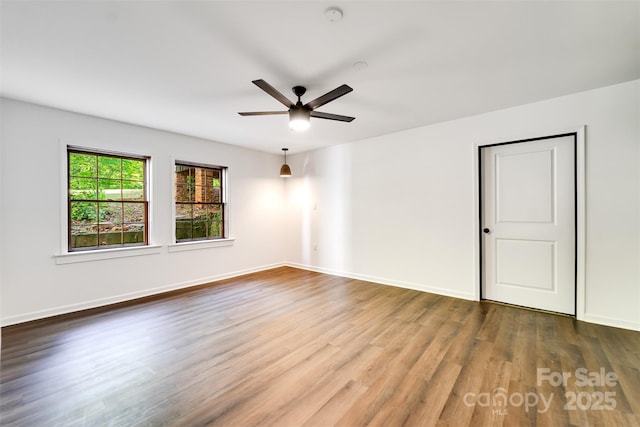 197 Briar Patch Rd, Cullowhee, NC 28723 - empty room featuring wood finished floors and ceiling fan