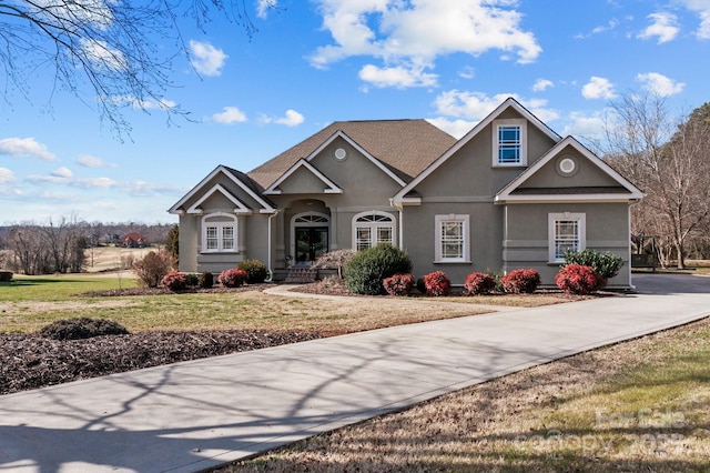 543 Muirfield Way, Salisbury, NC 28144 - traditional-style house featuring stucco siding and a front lawn