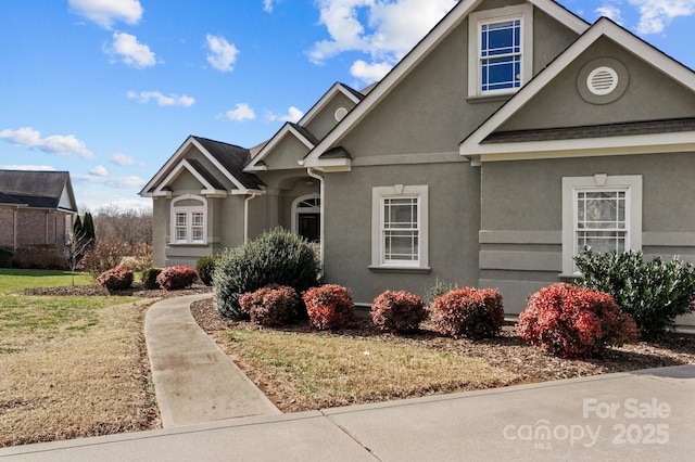 543 Muirfield Way, Salisbury, NC 28144 - view of front of home with stucco siding and a front yard