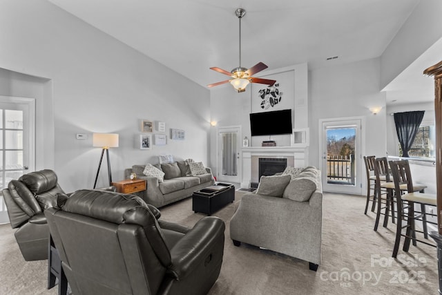 543 Muirfield Way, Salisbury, NC 28144 - living area with a towering ceiling, carpet flooring, a tile fireplace, and ceiling fan