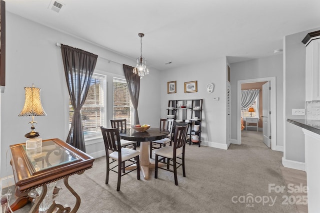 543 Muirfield Way, Salisbury, NC 28144 - dining space with a chandelier and light carpet