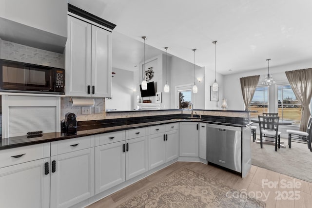 543 Muirfield Way, Salisbury, NC 28144 - kitchen featuring dishwasher, light wood-style flooring, black microwave, dark countertops, and pendant lighting