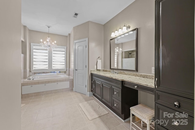 543 Muirfield Way, Salisbury, NC 28144 - full bathroom with a chandelier, vanity, a garden tub, and tile patterned flooring