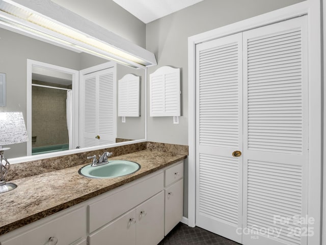 140 W Lake Dr Unit 301, Lake Lure, NC 28746 - full bath featuring a closet, vanity, and curtained shower