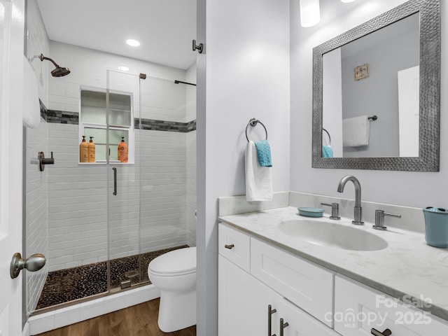 140 W Lake Dr Unit 301, Lake Lure, NC 28746 - bathroom with a shower stall, vanity, and wood finished floors