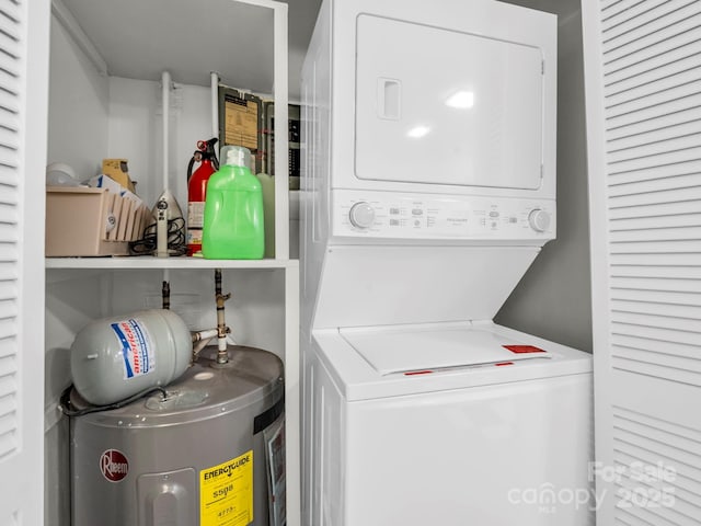 140 W Lake Dr Unit 301, Lake Lure, NC 28746 - laundry room featuring stacked washer and clothes dryer and water heater