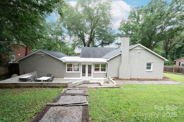 122 15th Ave NW, Hickory, NC 28601 - back of house with a chimney, french doors, brick siding, and a patio area