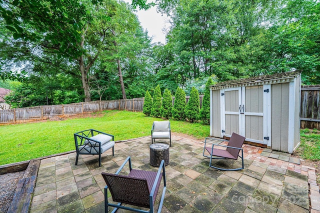 122 15th Ave NW, Hickory, NC 28601 - fenced backyard with a patio area, a shed, and view of scattered trees
