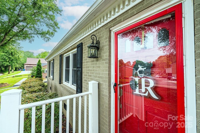122 15th Ave NW, Hickory, NC 28601 - doorway to property with brick siding