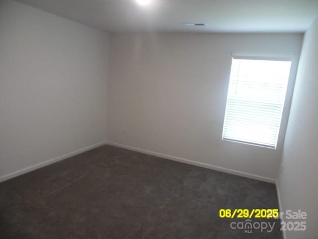 570 30th Avenue Cir NE, Hickory, NC 28601 - carpeted spare room featuring baseboards