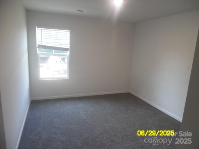 570 30th Avenue Cir NE, Hickory, NC 28601 - unfurnished room featuring dark colored carpet