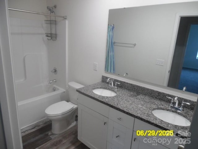 570 30th Avenue Cir NE, Hickory, NC 28601 - full bath with double vanity, shower / bath combination with curtain, and wood finished floors