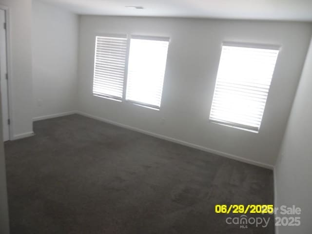 570 30th Avenue Cir NE, Hickory, NC 28601 - empty room featuring dark colored carpet