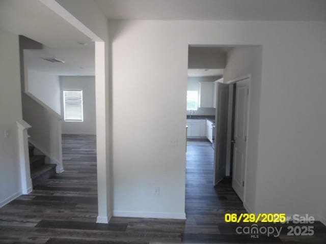 570 30th Avenue Cir NE, Hickory, NC 28601 - corridor with dark wood-type flooring and stairs