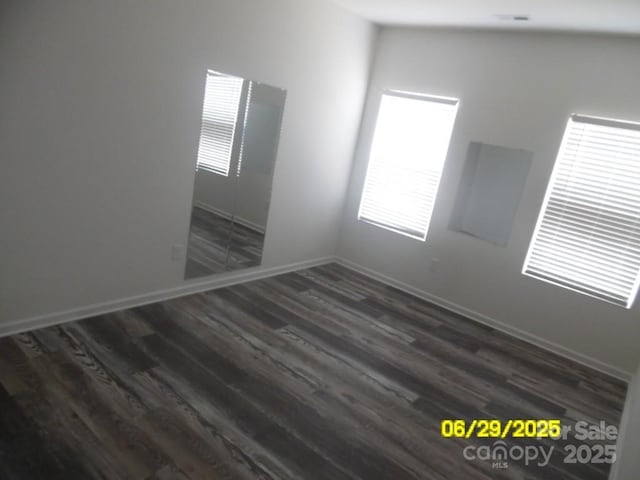 570 30th Avenue Cir NE, Hickory, NC 28601 - empty room with wood finished floors and healthy amount of natural light