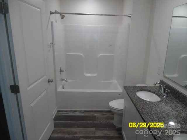 570 30th Avenue Cir NE, Hickory, NC 28601 - full bathroom featuring wood finished floors, vanity, and tub / shower combination