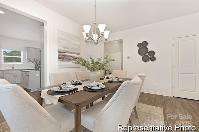 130 Fairfield Dr Unit 20, Troutman, NC 28166 - dining room with wood finished floors and a chandelier