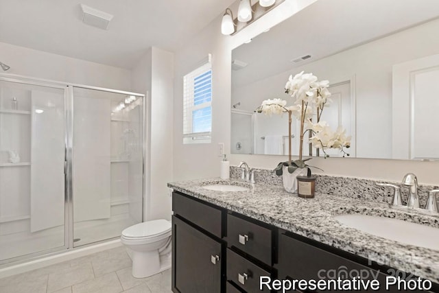 130 Fairfield Dr Unit 20, Troutman, NC 28166 - full bath featuring a stall shower, double vanity, and tile patterned floors