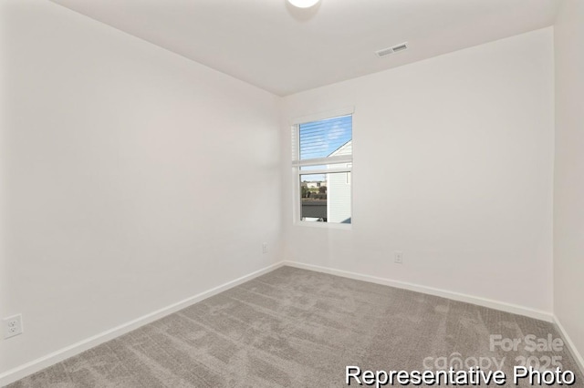 130 Fairfield Dr Unit 20, Troutman, NC 28166 - carpeted empty room with baseboards