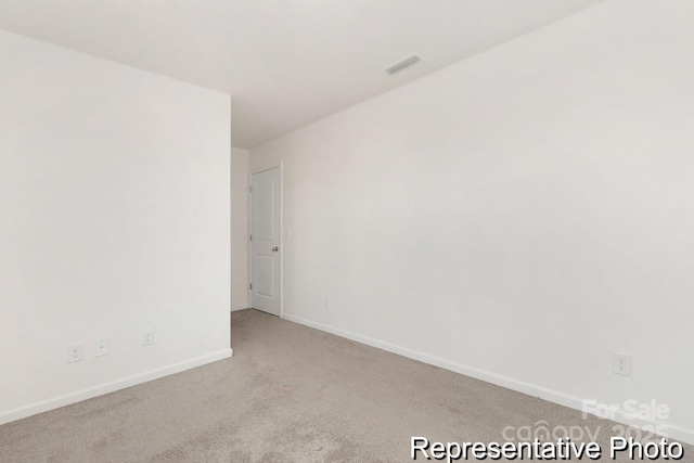 130 Fairfield Dr Unit 20, Troutman, NC 28166 - carpeted spare room with baseboards