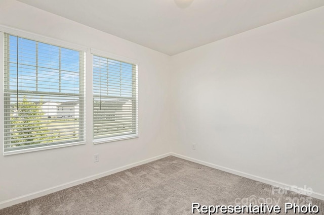130 Fairfield Dr Unit 20, Troutman, NC 28166 - carpeted spare room featuring plenty of natural light