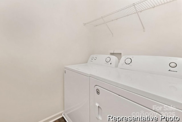 130 Fairfield Dr Unit 20, Troutman, NC 28166 - laundry room featuring separate washer and dryer and baseboards