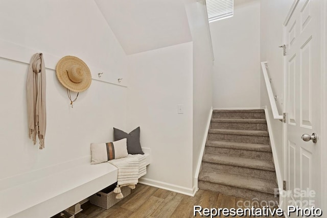 130 Fairfield Dr Unit 20, Troutman, NC 28166 - stairway featuring wood finished floors and lofted ceiling