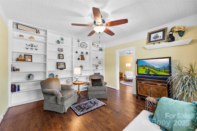 262 8th Ave, Cramerton, NC 28032 - living area featuring a ceiling fan, wood-type flooring, ornamental molding, and built in shelves