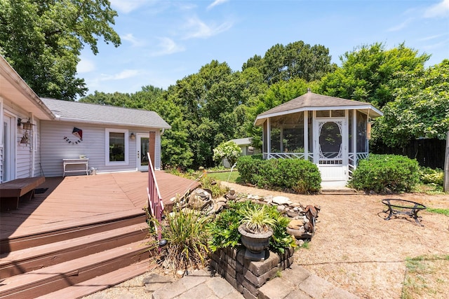 262 8th Ave, Cramerton, NC 28032 - wooden terrace with a sunroom and a fire pit