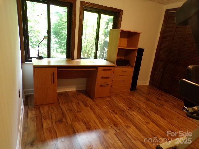 140 Beechwood Cir, Hendersonville, NC 28739 - unfurnished office featuring wood finished floors