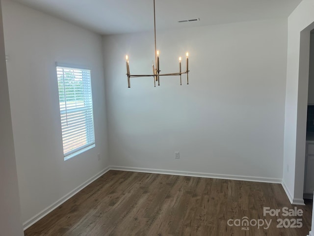 1005 Lorrie Ln Unit 84, Albemarle, NC 28001 - unfurnished dining area featuring a chandelier and dark wood-type flooring