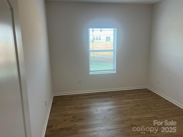 1005 Lorrie Ln Unit 84, Albemarle, NC 28001 - unfurnished room featuring dark wood-style floors and baseboards