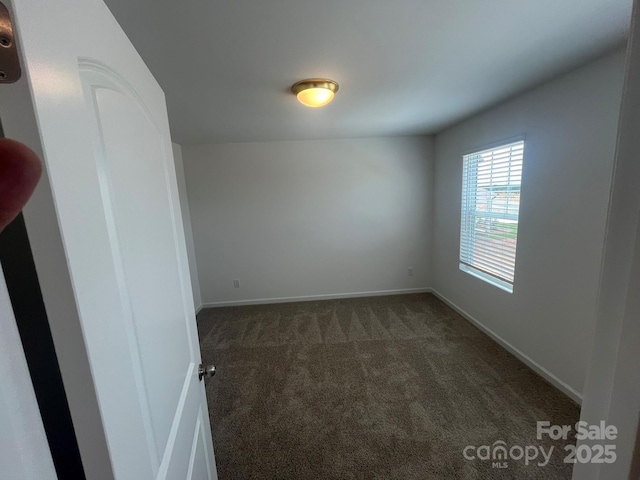 1005 Lorrie Ln Unit 84, Albemarle, NC 28001 - empty room featuring carpet flooring and baseboards