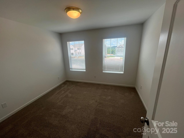 1005 Lorrie Ln Unit 84, Albemarle, NC 28001 - spare room with carpet and baseboards