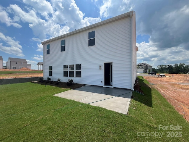1005 Lorrie Ln Unit 84, Albemarle, NC 28001 - rear view of property with a patio area and a lawn