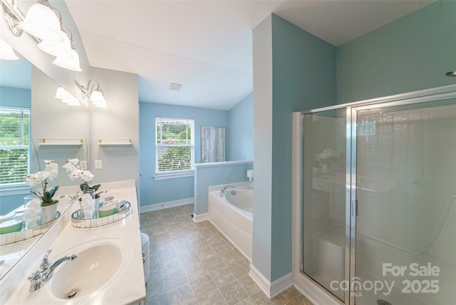 8509 Castle Cliff Dr, Matthews, NC 28105 - full bath with a garden tub, a stall shower, double vanity, and lofted ceiling