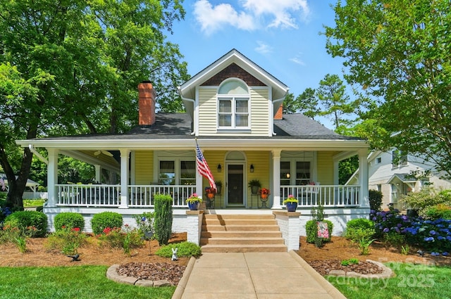 22 Poplar St, Belmont, NC 28012 - view of front of property featuring a porch, a shingled roof, and a chimney