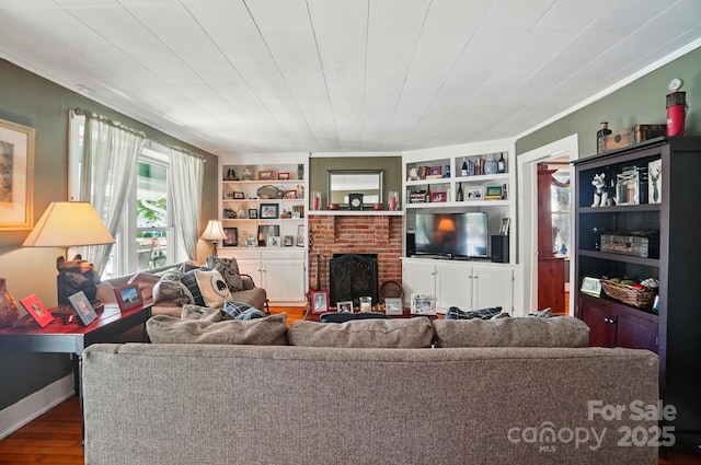 22 Poplar St, Belmont, NC 28012 - living room with wood finished floors, crown molding, a fireplace, and built in shelves