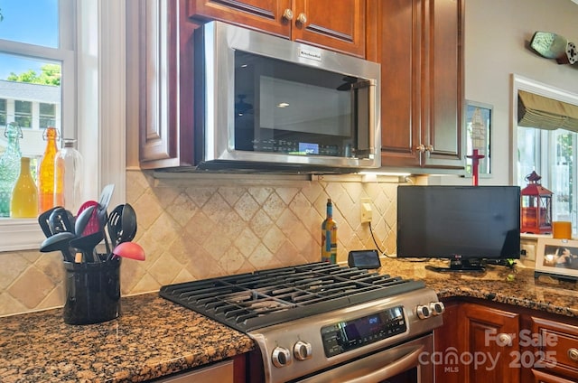 22 Poplar St, Belmont, NC 28012 - kitchen featuring stainless steel appliances, backsplash, and dark stone counters