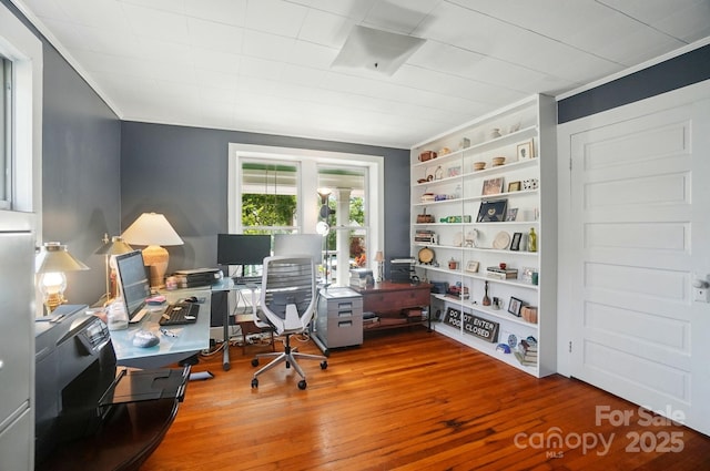 22 Poplar St, Belmont, NC 28012 - home office with hardwood / wood-style floors, built in shelves, and crown molding