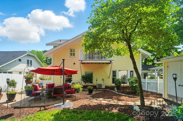 22 Poplar St, Belmont, NC 28012 - rear view of house featuring a patio area