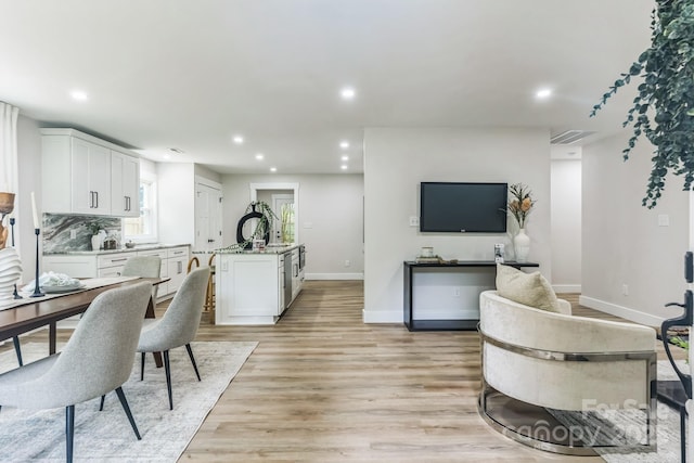 1208 Tarrington Ave, Charlotte, NC 28205 - living area with recessed lighting and light wood-type flooring