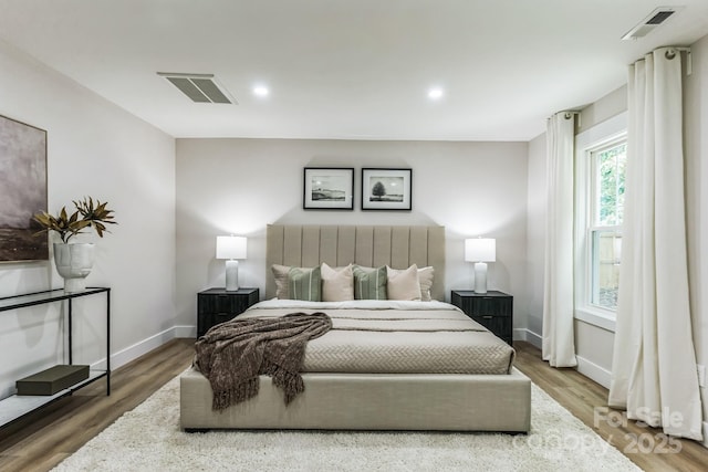 1208 Tarrington Ave, Charlotte, NC 28205 - bedroom featuring wood finished floors and recessed lighting