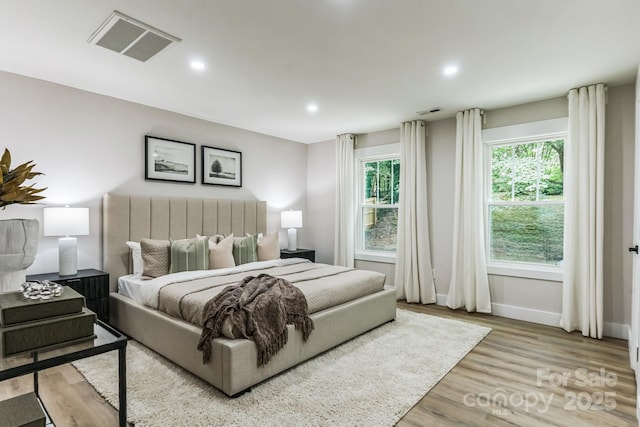 1208 Tarrington Ave, Charlotte, NC 28205 - bedroom featuring wood finished floors and recessed lighting