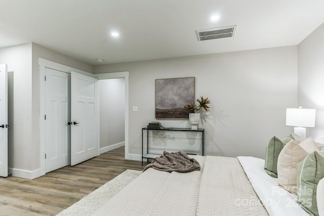 1208 Tarrington Ave, Charlotte, NC 28205 - bedroom featuring wood finished floors and recessed lighting