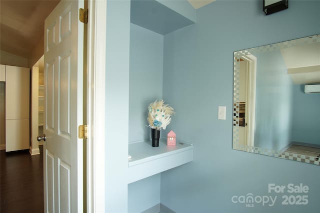 3974 Pleasant Plains Rd, Matthews, NC 28104 - hall featuring an AC wall unit and dark wood-style floors