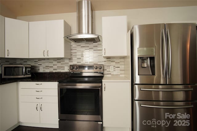 3974 Pleasant Plains Rd, Matthews, NC 28104 - kitchen with appliances with stainless steel finishes, wall chimney exhaust hood, white cabinetry, and backsplash