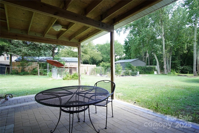 3974 Pleasant Plains Rd, Matthews, NC 28104 - fenced backyard featuring a patio and outdoor dining space