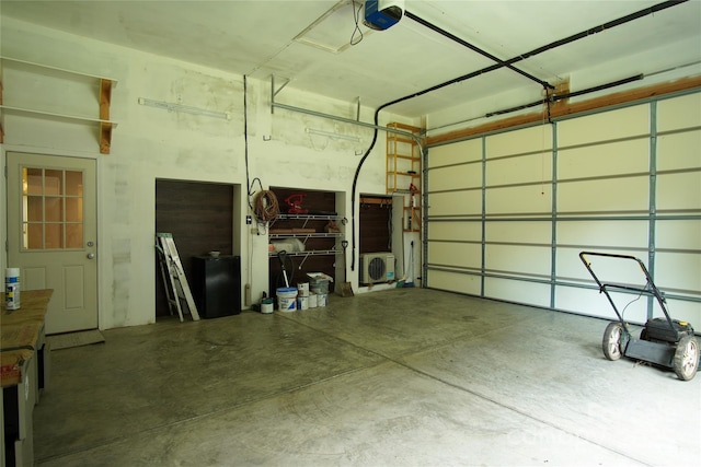 3974 Pleasant Plains Rd, Matthews, NC 28104 - garage with a garage door opener and fridge