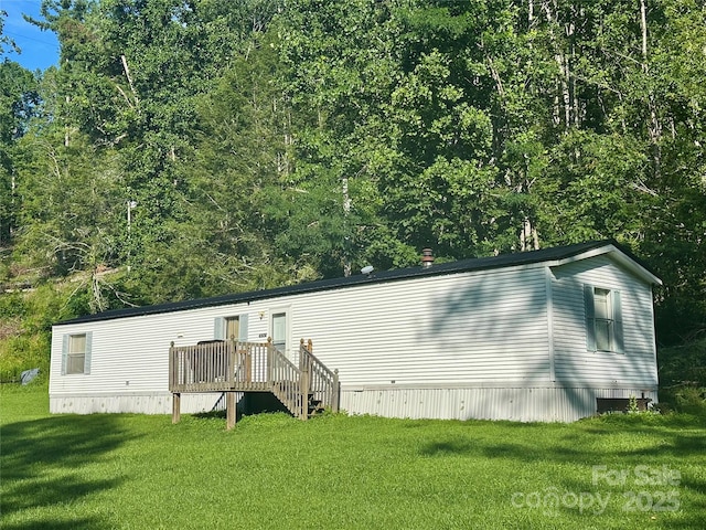 492 Chestnut Mountain Rd, Spruce Pine, NC 28777 - back of house with a yard and a wooden deck